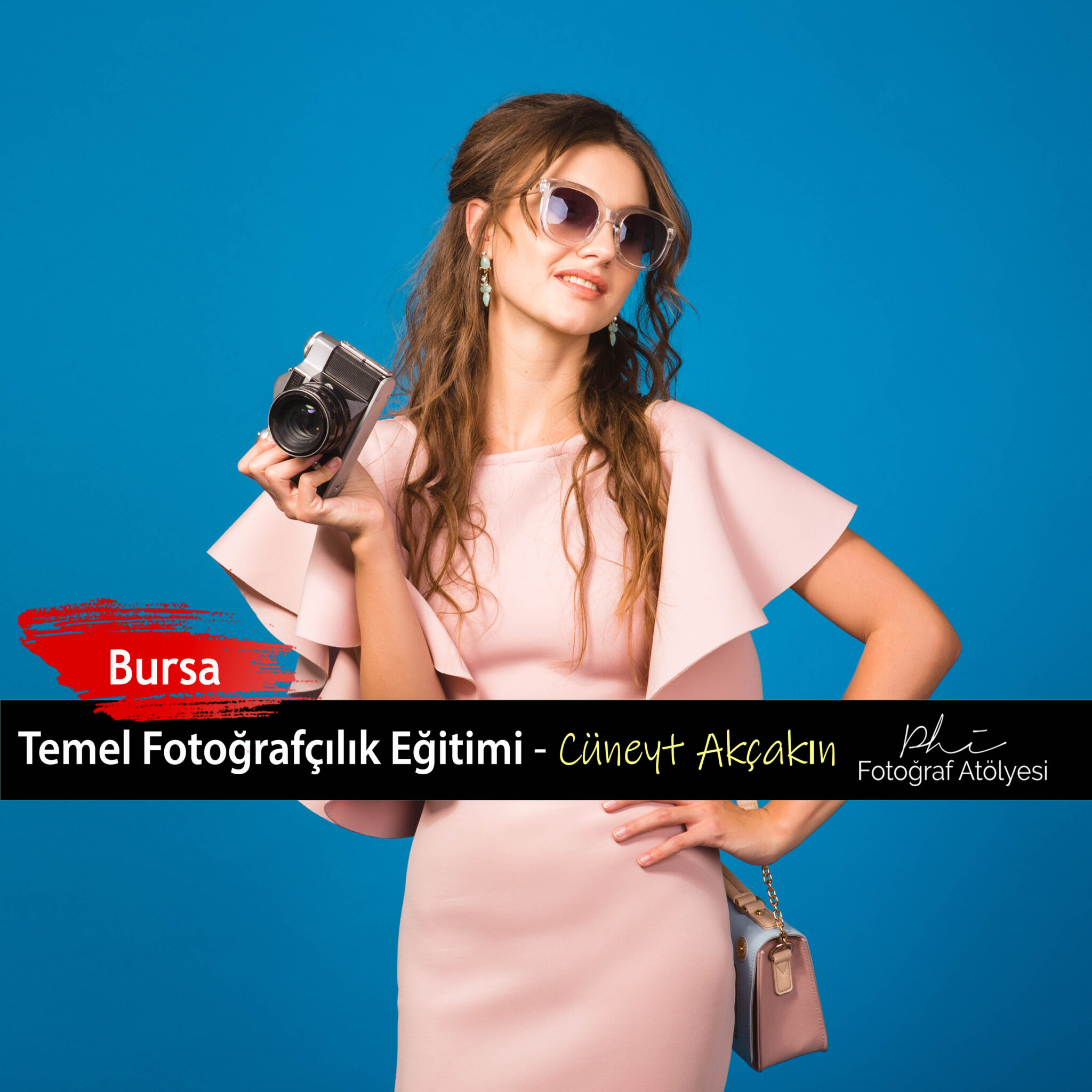 young stylish sexy woman in pink luxury dress, summer fashion trend, chic style, sunglasses, blue studio background, taking pictures on vintage camera